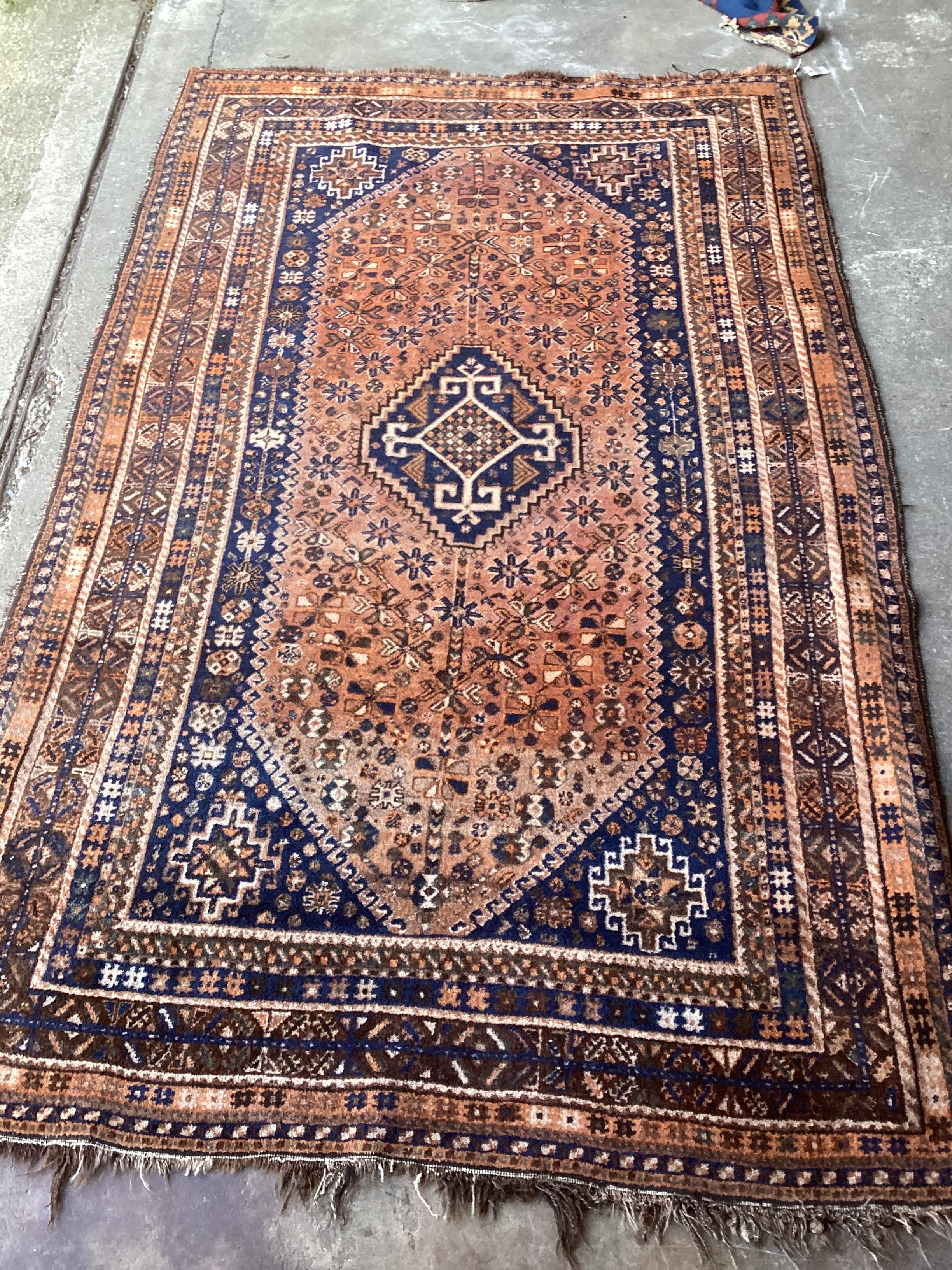 A Hamadan faded red ground rug, 260 x 160cm